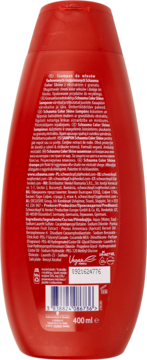 Tył czerwonej butelki szamponu Schauma Color Shine z ekstraktem granatu, etykietą i składnikami dla włosów farbowanych.