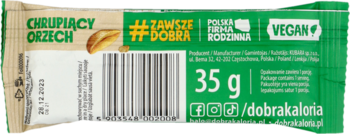Dobra Kaloria baton daktylowy Chrupiący Orzech 35g, tył opakowania, zielono-beżowy, logo VEGAN.
