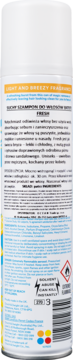 Tył białego suchego szamponu "Fresh" z żółtym paskiem u góry, niebieskimi napisami i ostrzeżeniami o łatwopalności.