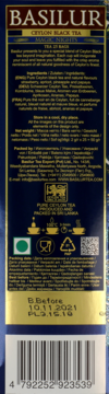 Tył opakowania herbaty Basilur Ceylon Black Tea Magic Nights, z nutą truskawki, moreli, ananasa i papai, niebiesko-złote.