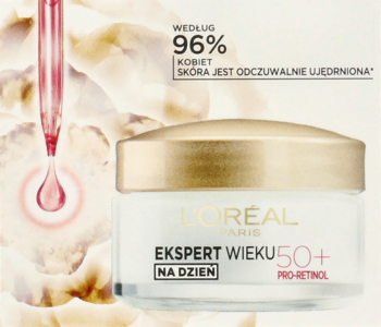 L'Oréal Ekspert Wieku 50+ Pro-Retinol krem na dzień w białym słoiku ze złotą pokrywką, z pipetą w tle.
