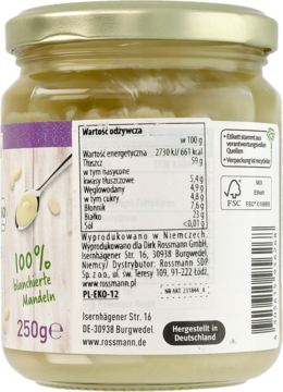 Tył słoika musu migdałowego enerBiO z etykietą, widoczną tabelą wartości odżywczych i napisem 100% blanszowane migdały.