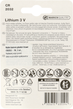 Tył opakowania baterii litowej CR 2032 3V Rossmann, z wielojęzycznymi opisami i piktogramami ostrzegawczymi.