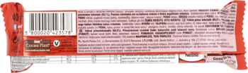 Tył opakowania czekolady waflowej w mlecznej czekoladzie. Widoczne informacje o produkcie, kod kreskowy i tabela wartości odżywczych.