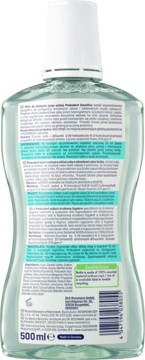 Tył butelki płynu Prokudent med Sensitive 500ml, przezroczysta, z białą nakrętką i etykietą z opisem produktu.