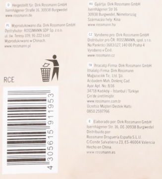 Dolna część opakowania produktu, widoczne: kod kreskowy, symbol recyklingu oraz dane dystrybutorów w różnych krajach.