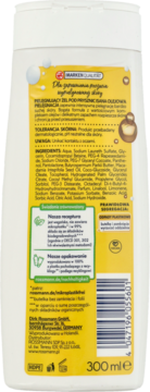 Tył białej butelki żelu pod prysznic Isana 300 ml z żółtą etykietą, widoczna lista składników i kod kreskowy.