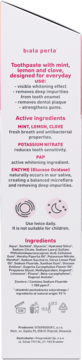 Tył opakowania pasty Biała Perła z miętą, cytryną i goździkami, opis składników i użycia, różowy tekst.