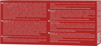 Tył opakowania ampułek Seboradin FORTE na wypadanie włosów, czerwone z instrukcjami w wielu językach.