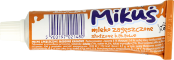 Mikuś mleko zagęszczone słodzone kakaowe w pomarańczowej tubce, widok z boku z widocznym kodem kreskowym i składem.