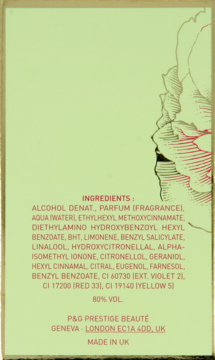 Tył opakowania perfum P&G Prestige Beauté; jasnozielony kartonik z czerwoną listą składników. Widoczna etykieta 'Made in UK'.