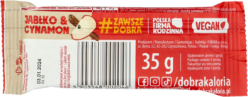 Tył opakowania batonika Dobra Kaloria Jabłko & Cynamon 35g, czerwono-białe, z kodem kreskowym i napisem VEGAN.