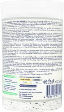 Tył okrągłego opakowania peelingujących płatków Rossmann z aktywnym węglem, widoczne informacje produktu.