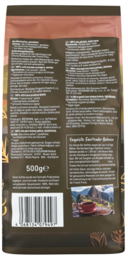 Tył brązowego opakowania kawy enerBiO Café de Perú 100% arabika mielona Fairtrade 500g. Opisy, kod kreskowy i górski krajobraz.
