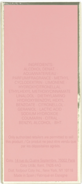 Tył różowego opakowania perfum Coty, widok na słabo czytelny skład, dane producenta i informacje Made in Spain.