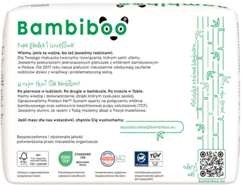 Tył białego opakowania pieluszek Bambiboo z włóknem bambusowym, zielone logo, tekst i certyfikaty.