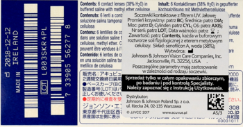Tył niebieskiego opakowania soczewek kontaktowych z filtrem UV, z widocznym kodem kreskowym i tekstem w kilku językach.