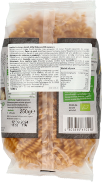Tył przezroczystego opakowania brązowego makaronu z ciecierzycy BIO, z etykietą pokazującą skład i wartości odżywcze.