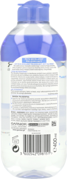 Tył Garnier Płyn Micelarny Pielęgnujący 400ml w przezroczystej butelce z niebieską nakrętką, widoczna etykieta ze składnikami.