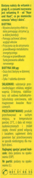 Tył opakowania suplementu diety Biotyna 300 µg, żółto-zielona etykieta z czarnym tekstem opisującym skład i użycie.