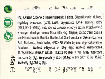Tył opakowania kwaśnych cukierków truskawkowo-jabłkowych, widoczna tabela składników odżywczych i dane producenta.
