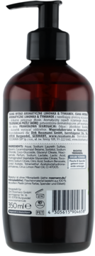 Tył brązowej butelki mydła Isana Limonka & Tymianek 350ml z czarną pompką, widoczne etykiety i składniki.