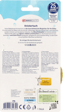 Tył opakowania sensorycznej chusty Babydream Knistertuch, z niemieckim opisem produktu i certyfikatami jakości.