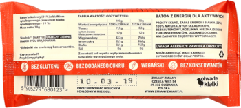 Tył opakowania wegańskiego batona bakaliowego z białkiem ryżu brązowego, widoczna tabela wartości odżywczych i deklaracje bezglutenowe, bez cukru.