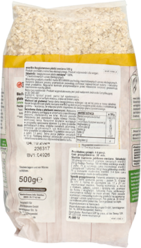 Tył przezroczystej torebki bezglutenowych płatków owsianych enerBiO 500g Rossmann z widoczną etykietą.