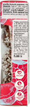 Tył opakowania enerBio owocowych kulek z daktylami, widoczne kulki z płatkami kokosa. Czerwone tło, ikony Vegan, Bez Glutenu i Laktozy.