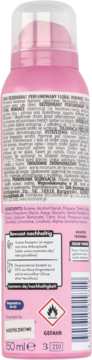Różowy dezodorant perfumowany Floral Romance w sprayu, widok z tyłu z listą składników i ikonami ostrzegawczymi.