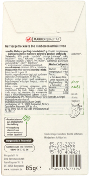 Tył opakowania liofilizowanych malin w czekoladzie Rossmann, z etykietą, kodem kreskowym i datą ważności 15.03.2022.