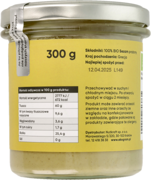 Tył słoika z aromatyczną pastą sezamową bio 300g, widoczna żółta etykieta z danymi odżywczymi i składem.