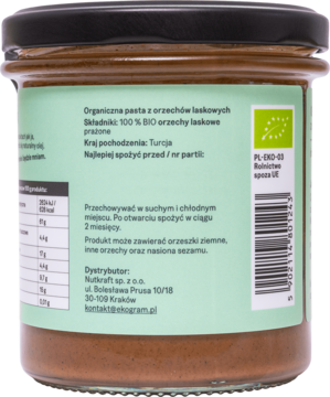 Tył słoika organicznej pasty z orzechów laskowych, zielona etykieta z polskim opisem i logo BIO.