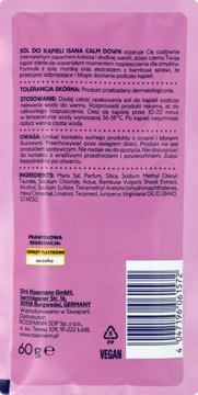 Tył różowego opakowania foliowej soli do kąpieli Isana Calm Down z tekstem, składem i kodem kreskowym.