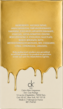Tył złotego opakowania wody toaletowej Calvin Klein CK One Gold, z motywem złocistych zacieków i składnikami.