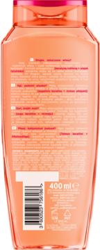 Tył pomarańczowej butelki szamponu L'Oréal Dream Long 400ml odbudowującego, z etykietą i kodem kreskowym.