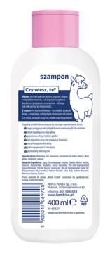 Biała butelka Bambino Szampon Alpaka 400 ml, widok z tyłu. Widoczny opis produktu, kod kreskowy i różowa nakrętka.