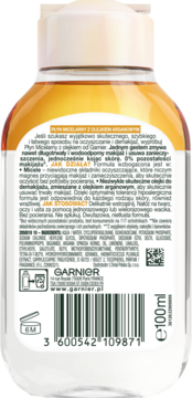 Tył butelki płynu micelarnego Garnier z olejkiem arganowym 100ml, widoczna pełna etykieta z opisem.