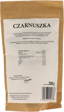 Czarnuszka ziarno w brązowej papierowej torebce, widok z tyłu z etykietą. Widoczne info odżywcze i data ważności.