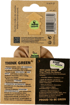 Tył brązowego opakowania gumki do włosów z bambusa, z etykietami 'Think Green' i 'Stop Plastic Go Nature'.