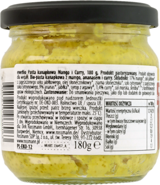 Tył szklanego słoika Bio Pasty do pieczywa z curry, mango i papają, widoczne informacje o produkcie.