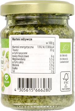 Tył szklanego słoika zielonego enerBio Pesto bazyliowego z etykietą zawierającą polskie wartości odżywcze i logo Vegan.