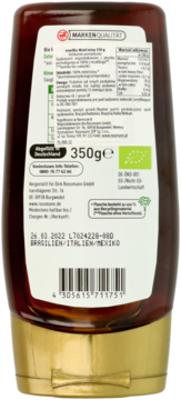 Tył brązowej butelki miodu leśnego Rossmann, 350g. Biała etykieta z zielonym logo BIO, widocznym tekstem.