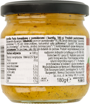Tył szklanego słoika enerBIO Pasta kanapkowa z pomidorami i bazylią, 180g, z etykietą odżywczą.