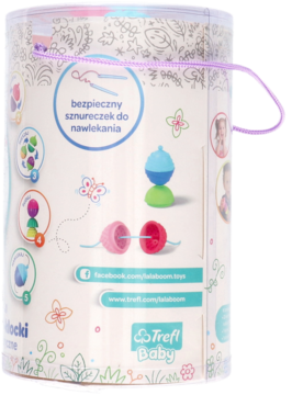 Tył cylindrycznego opakowania Trefl Baby kulko-klocków, z ilustracjami użycia i napisem: bezpieczny sznureczek do nawlekania.