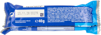 Tył niebieskiego opakowania batonika z datą ważności 23.11.20, wagą 40g, symbolem recyklingu i składnikami.