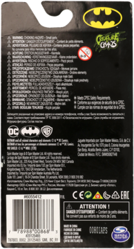 Tył czarnego opakowania figurki Batman z żółtym logo Batmana, ostrzeżeniami i kodem kreskowym.