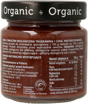 Tył szklanego słoika z organiczną konfiturą truskawkową z chia, z etykietą pokazującą skład i wartości odżywcze.