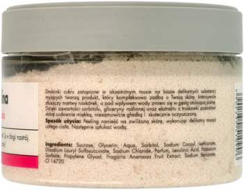 Tył opakowania cukrowego peelingu do ciała w przezroczystym słoiku z szarą pokrywką, z widoczną etykietą składników.